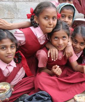 School girls eating