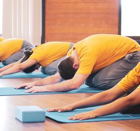 Group doing shishu asana