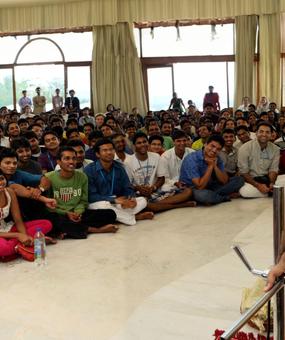 Meditation-Happiness-for-Youth-Gurudev-with-youth-in-Bengaluru-ashram-scaled.jpg